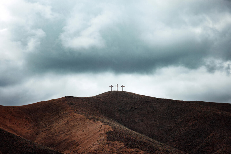Cross on a desert hill