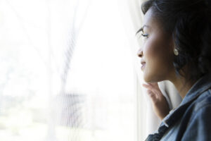 A woman looking out the window