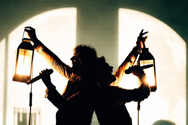 Image of for King + Country holding lamps